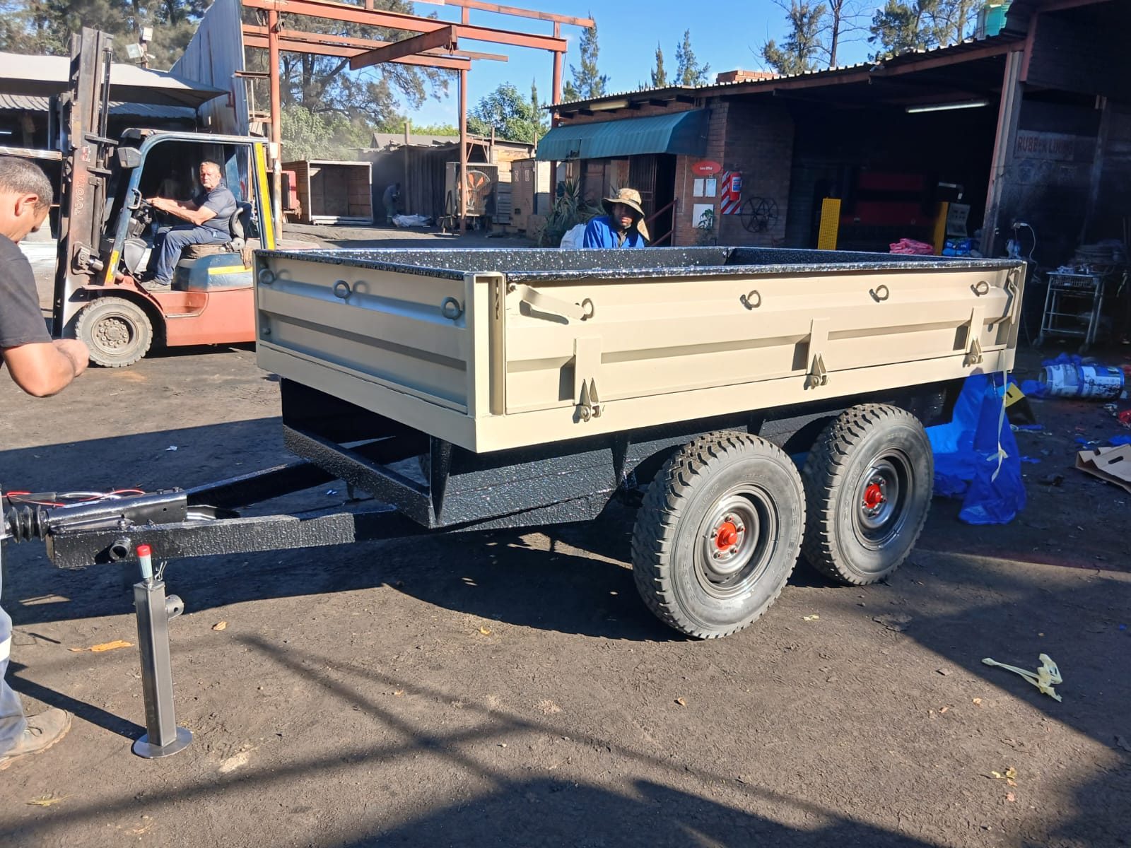 Dropside trailer standing in the yard