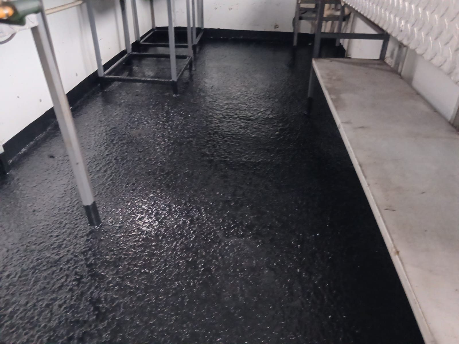 Catering trailer with a black rubberised floor