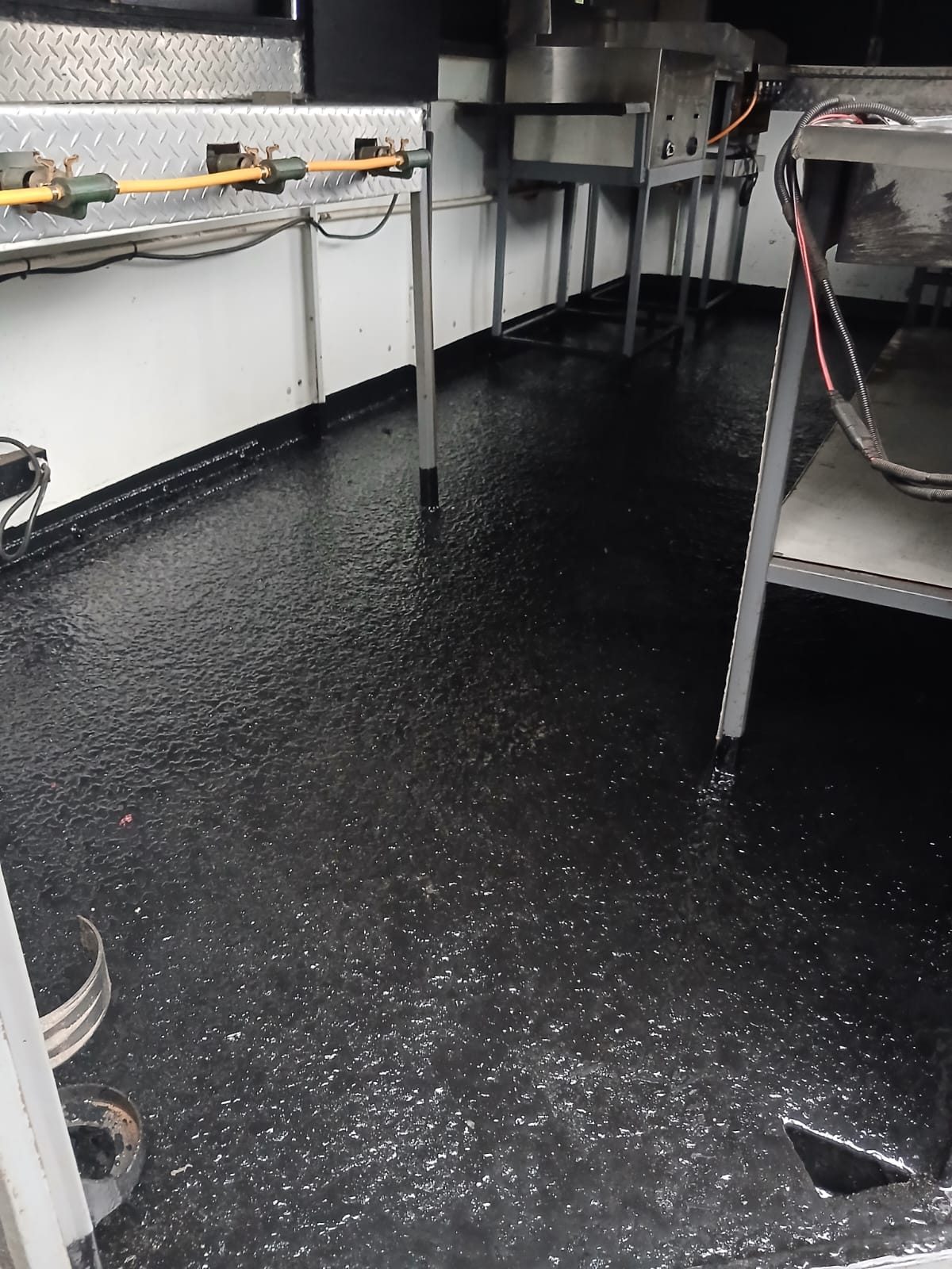 Catering trailer with a black rubberised floor